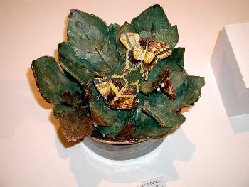 pottery butterflies on potter leaf