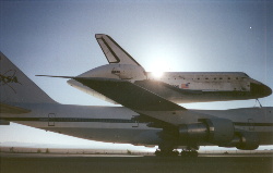 silouette of shuttle and carrier