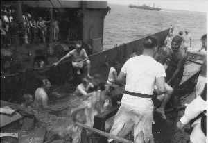 polliwogs being dunked in a landing barge, ww2