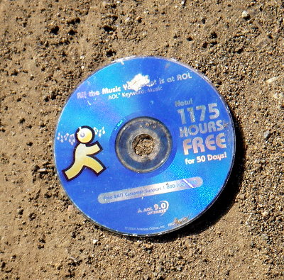 AOL CD in the dirt