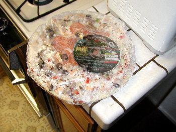 game cd inside a pizza wrapping