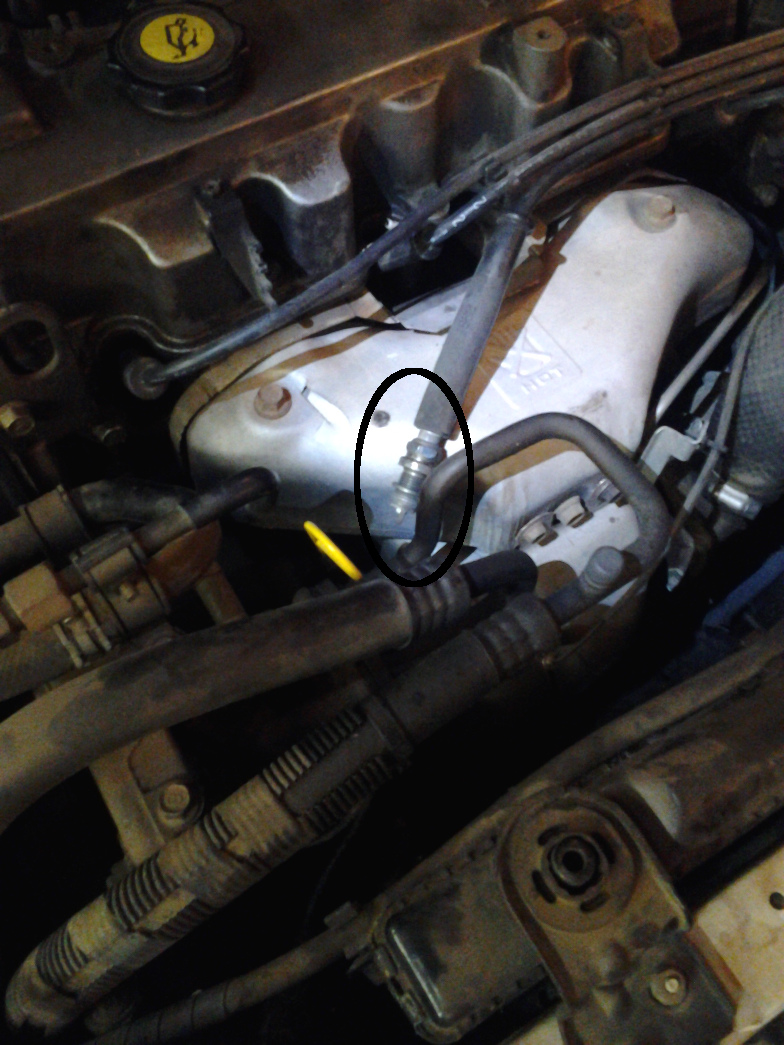stripped and blown out sparkplug