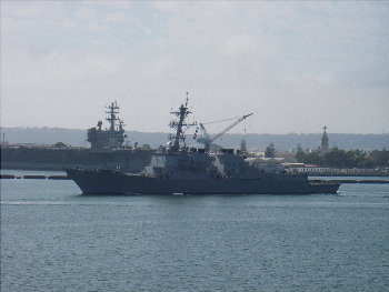 DDG-88, the USS Preble, passes the CVN-76 USS Reagan